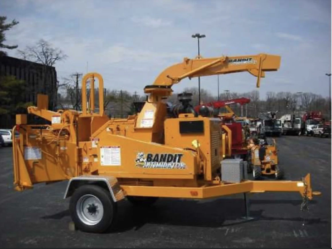Yellow Bandit wood chipper used to chip tree branches